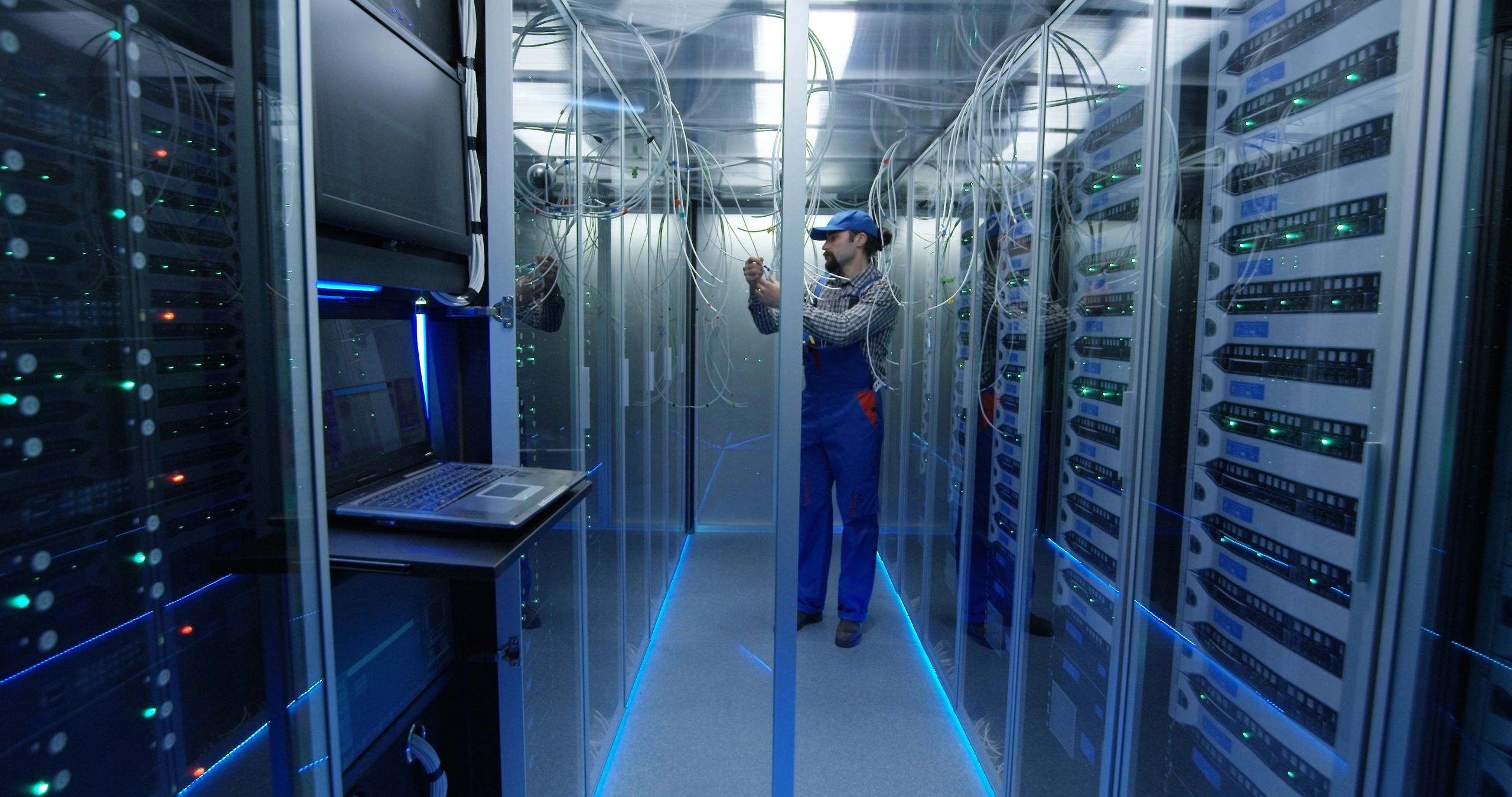 Technician working in a data center