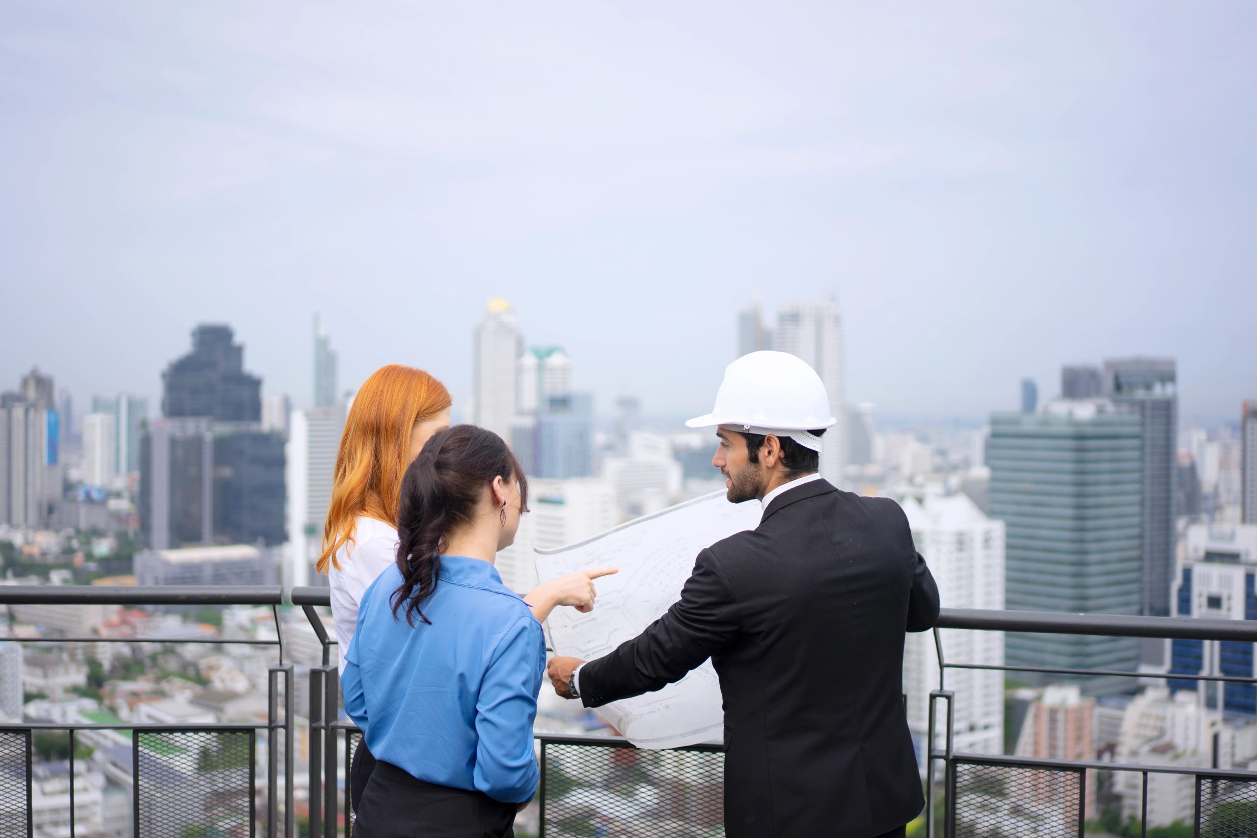 Project team meeting on a rooftop