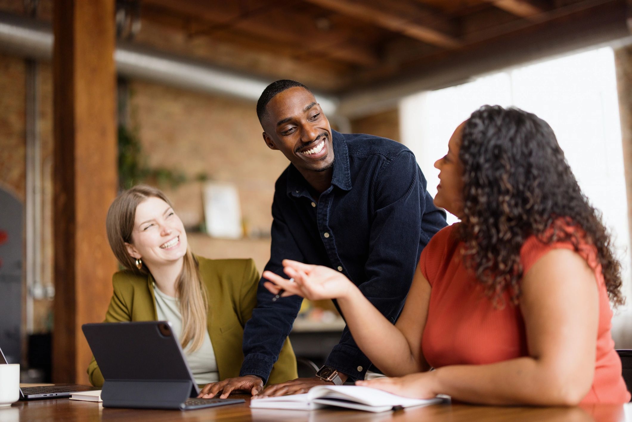 Technology team discussing a project in an office meeting