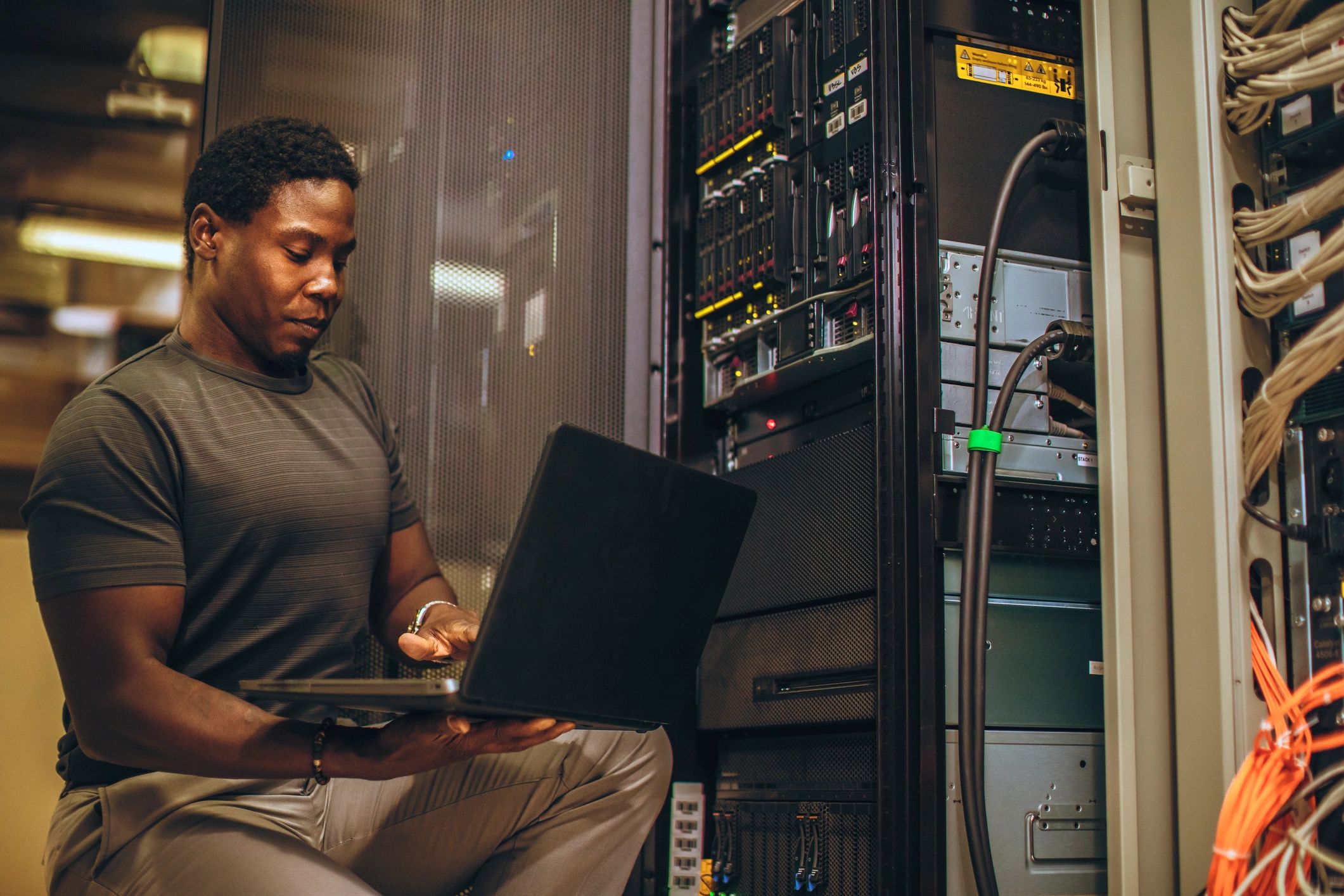 Engineer working in a server room