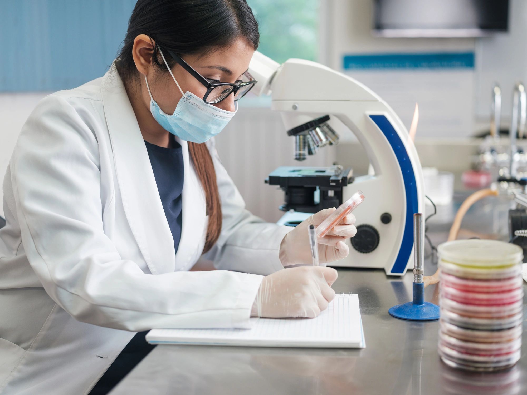 Medical laboratory technician analyzing samples