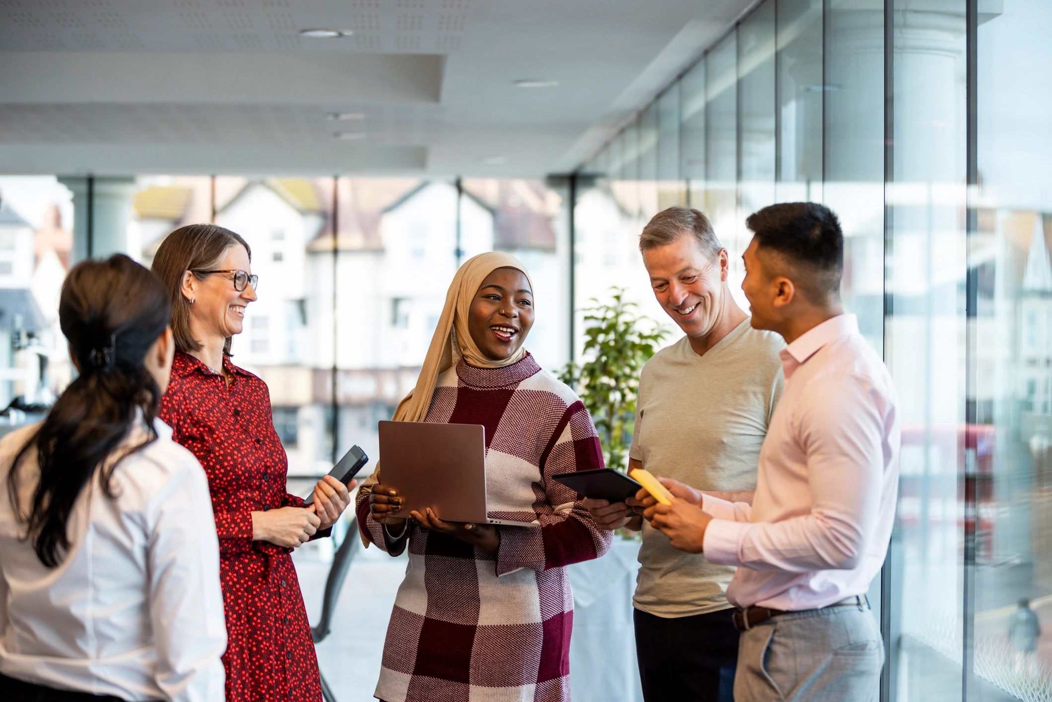 Business professionals collaborating in a shared services office