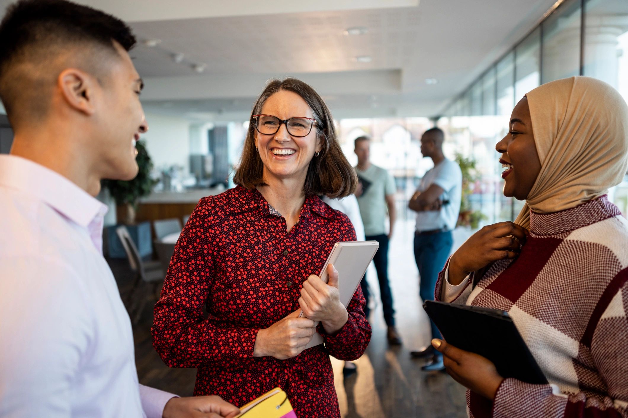 Customer operations and support professionals in a business meeting